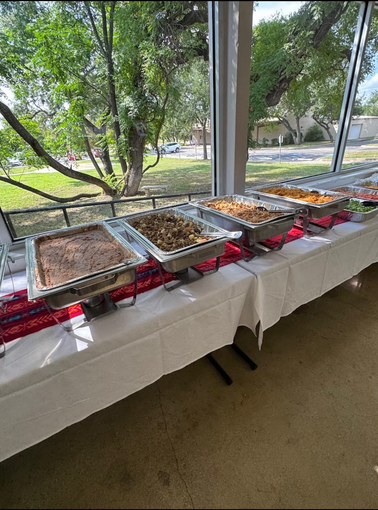 Mia's catering chafing dishes by window