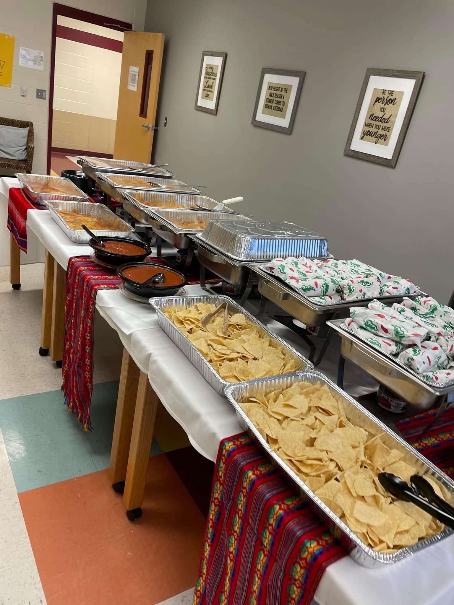 Mia's catering buffet line with chips and salsa